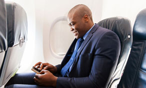 man on plane with mobile device, Xerox, Connect Key, Heartland Digital Imaging, Xerox, Agent, Dealer, Solutions Provider, Marion, Illinois, IL